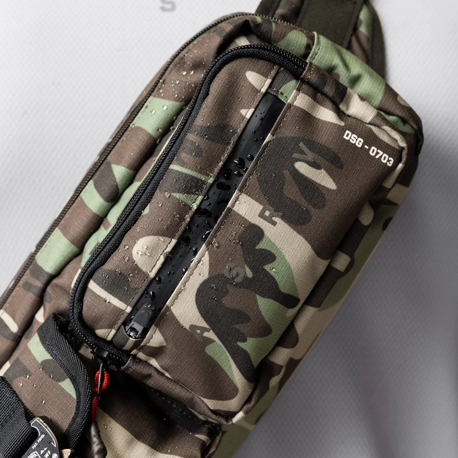 0703. Cordura® Tech Crossbody Pack - Woodland Camo