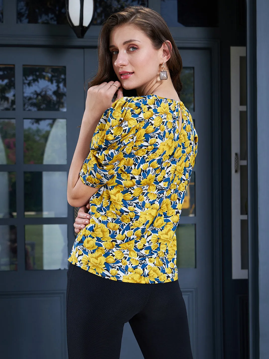 Berrylush Women Yellow & Blue Floral Printed Round Neck Puff Sleeves Crepe Button-Up Regular Top