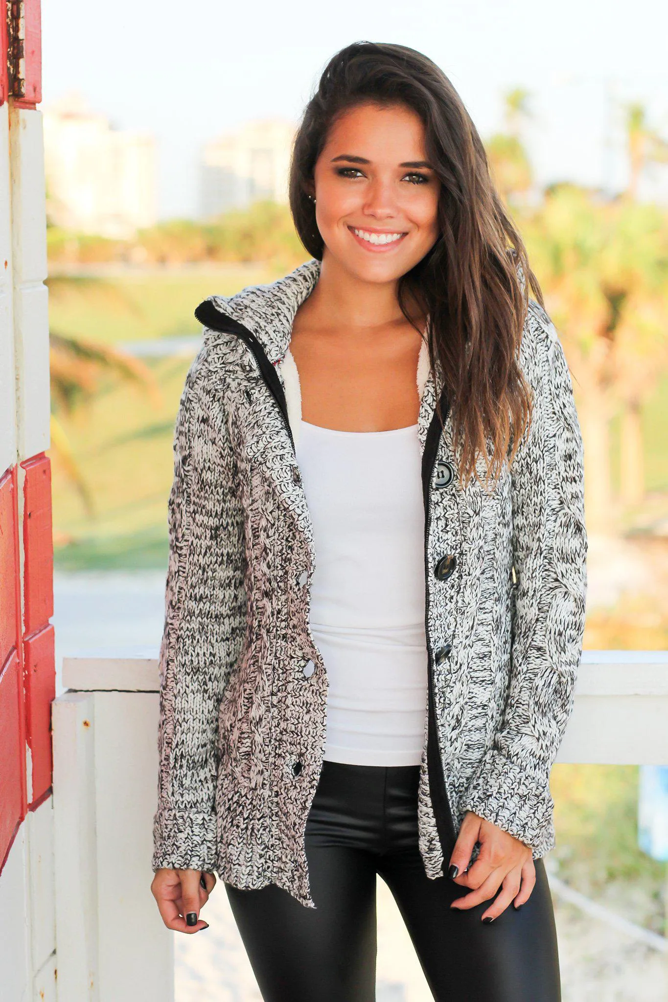 Black and White Sweater with Fur Hood