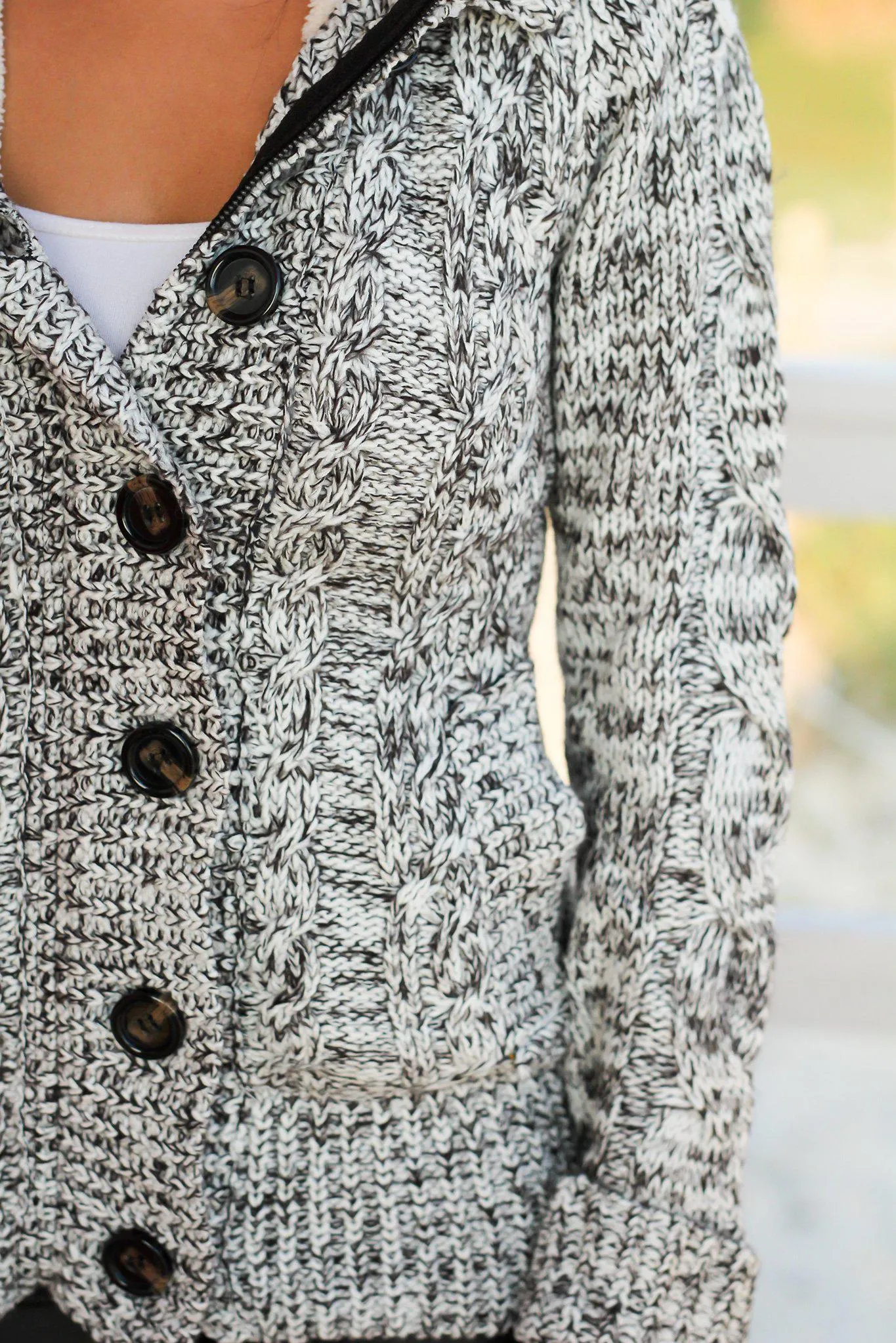 Black and White Sweater with Fur Hood