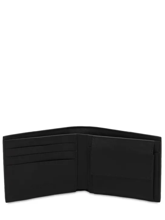 Bottega Veneta   Cassette leather bi-fold wallet 