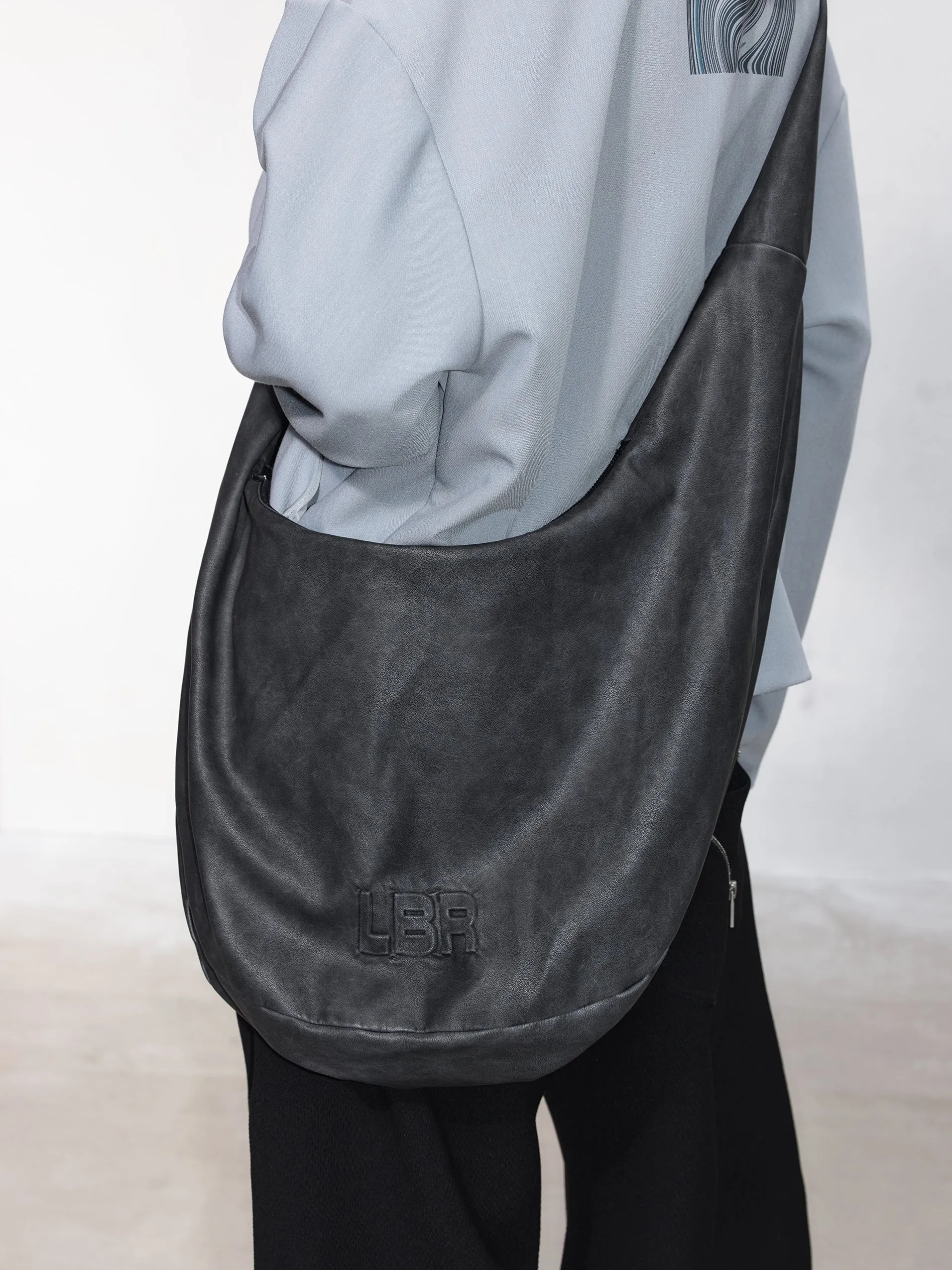 Embossed adjustable shoulder strap PU leather bag