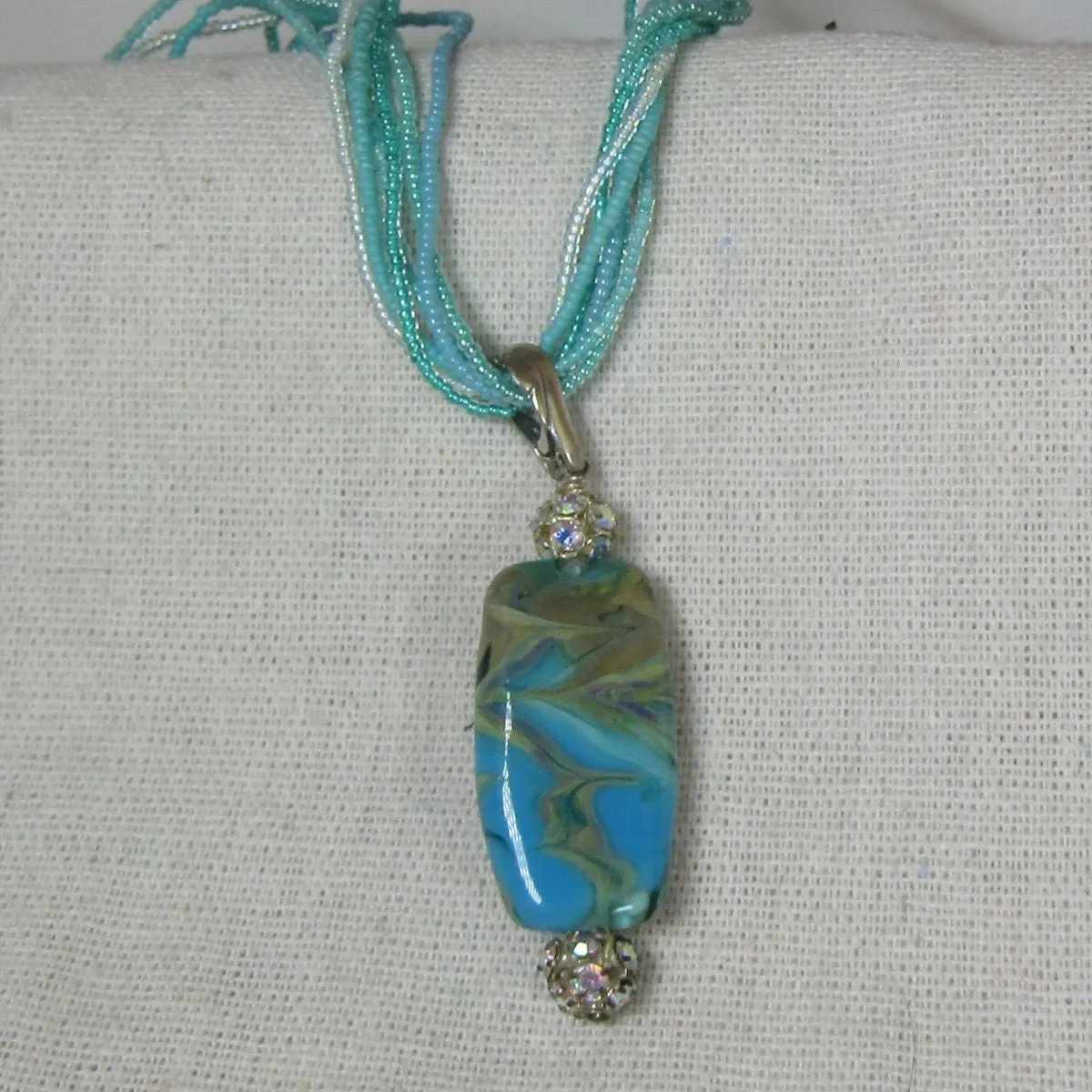 Exotic Aqua Lampwork Pendant on Aqua Seed Bead Necklace