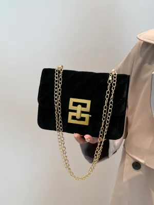 Faux velvet flap shoulder bag with twist lock and chain