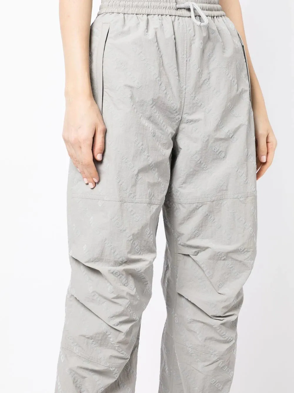 FLOCKED LOGO TRACK PANTS