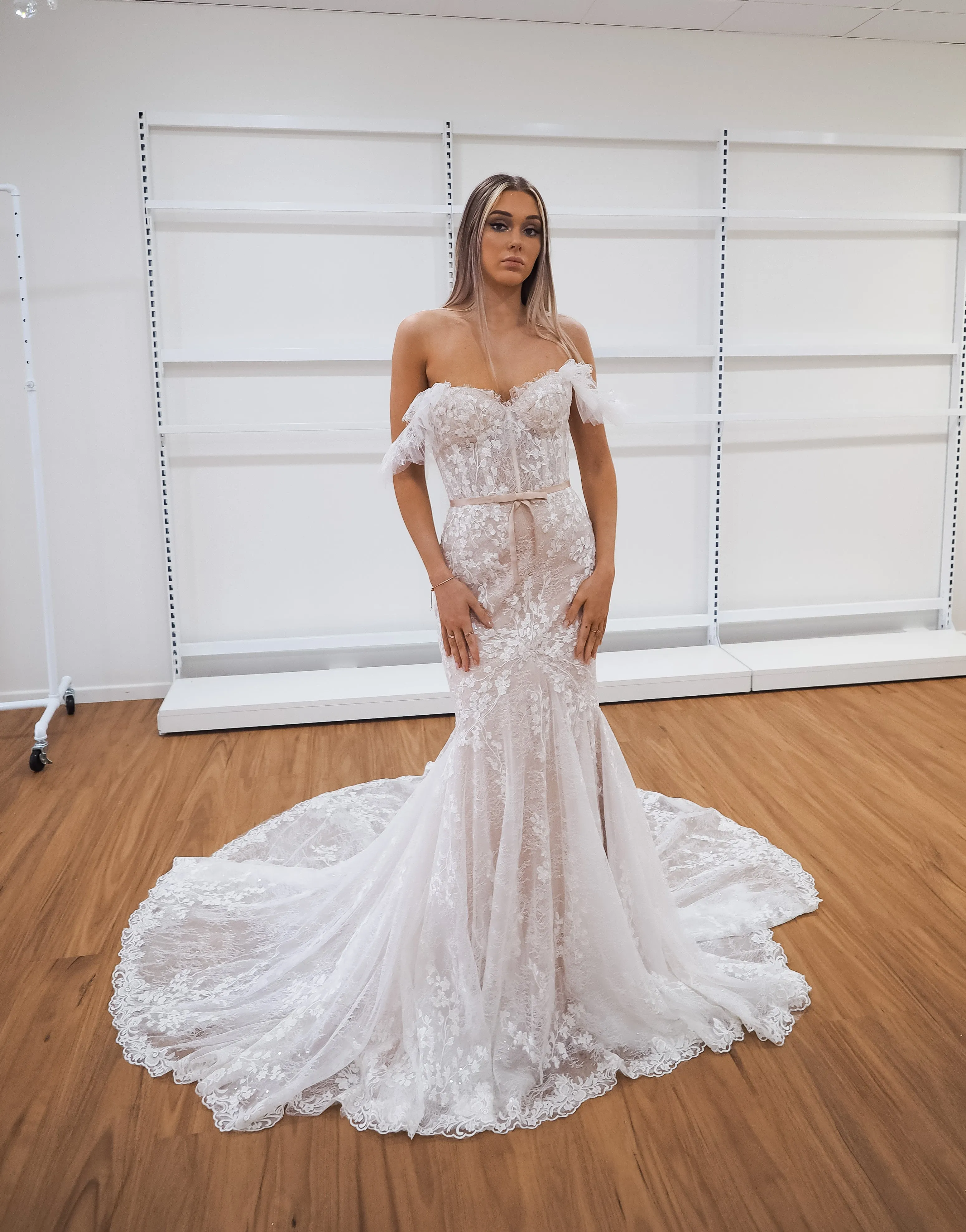 hidden bustier cups blush mermaid dress with long train for hire