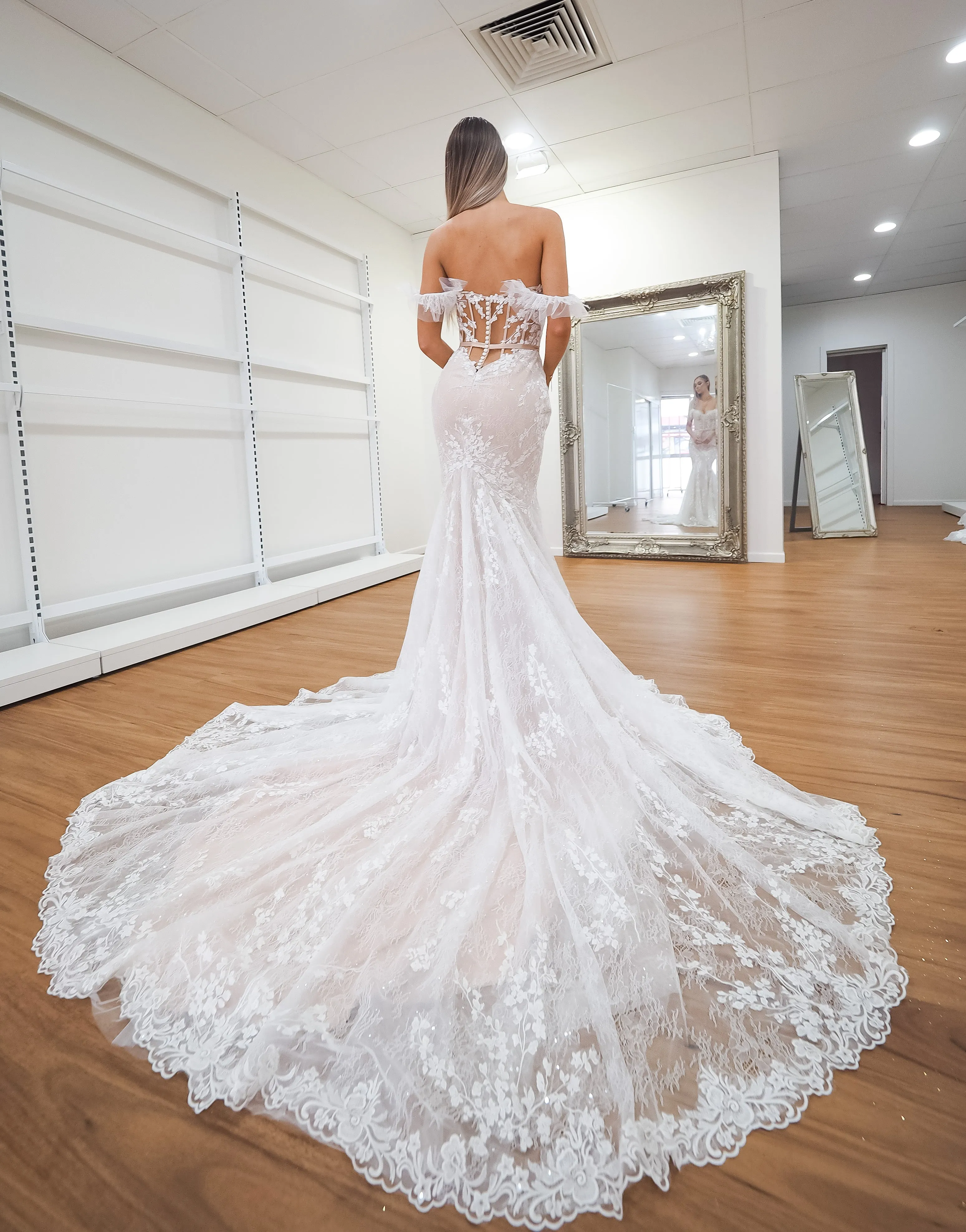 hidden bustier cups blush mermaid dress with long train for hire