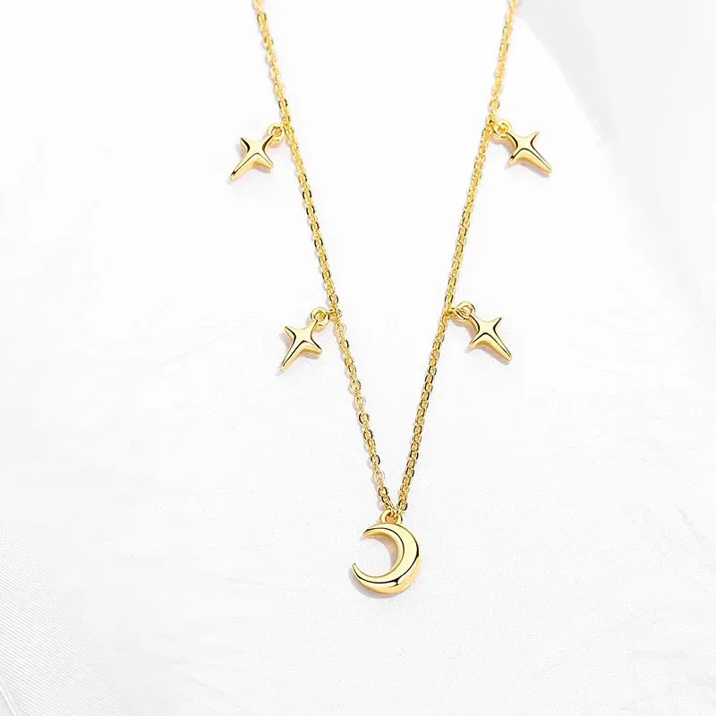 JC - Women's Evil Eye Necklace: Silver link chain with moon and blue evil eye charm
