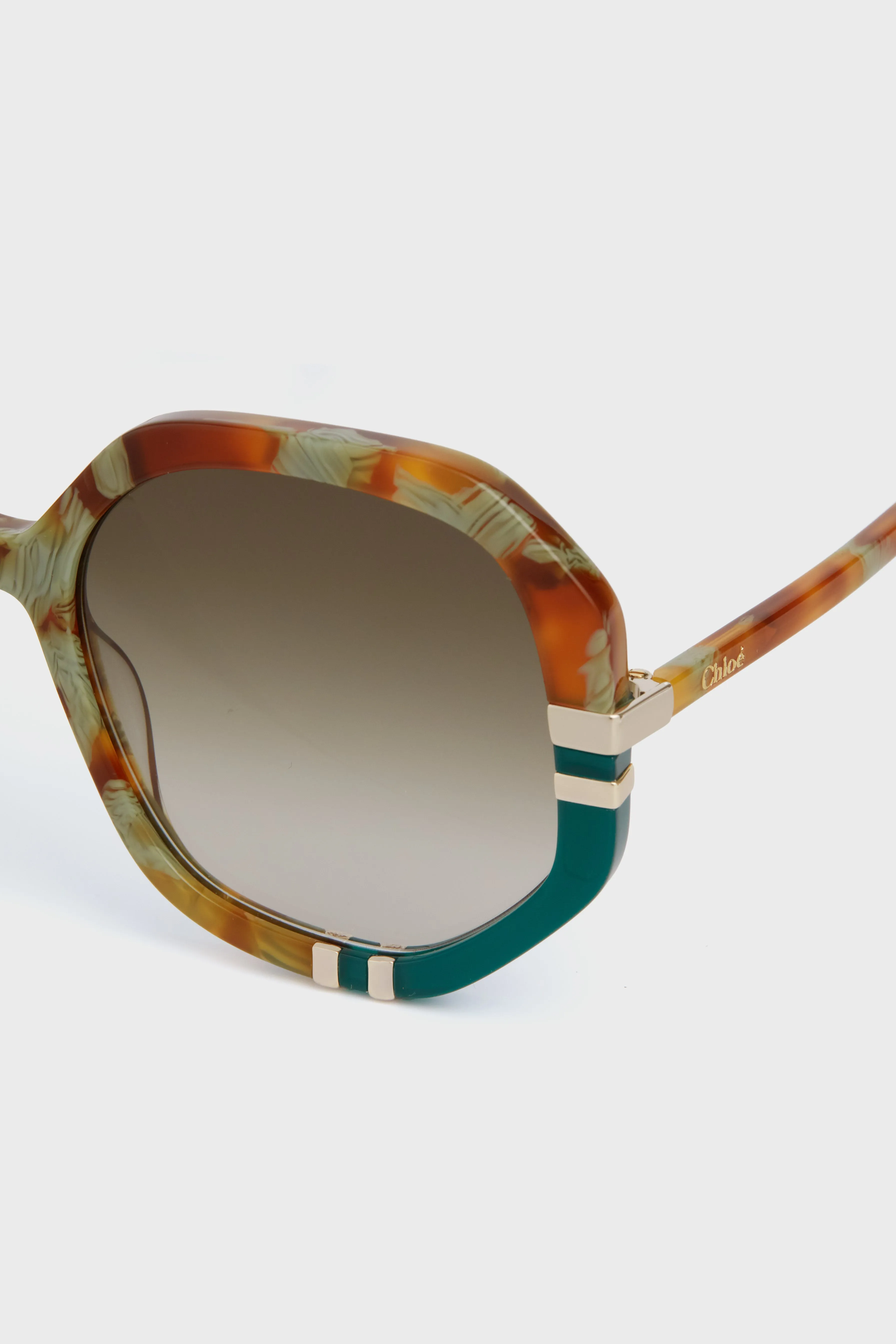 Shiny Caramel and Mint Green Spotted Havana West