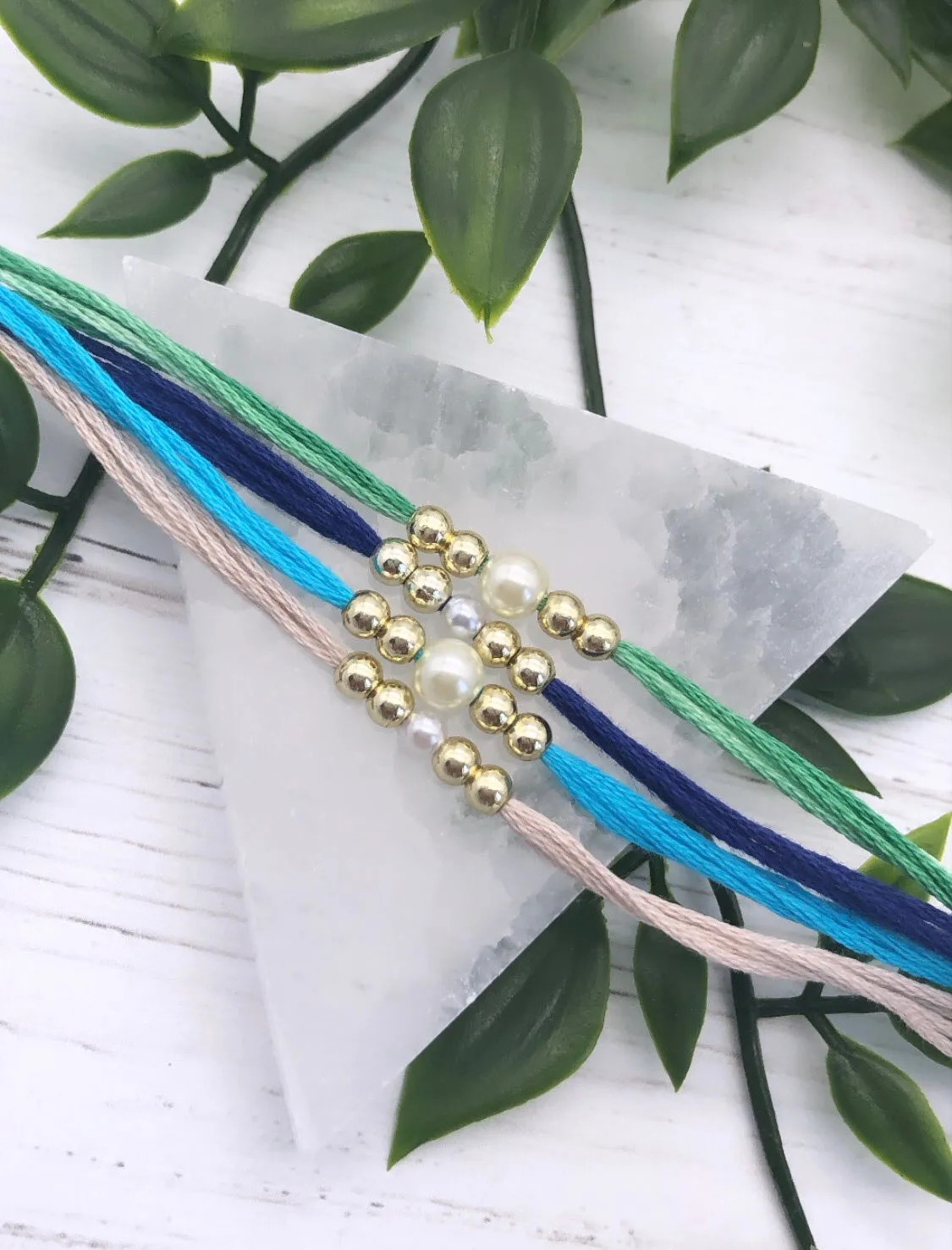 Simple Pearl Rakhi / Rakhri
