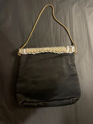 vintage ladies evening bag, black satin with gold strap, and paste clasp 1950s